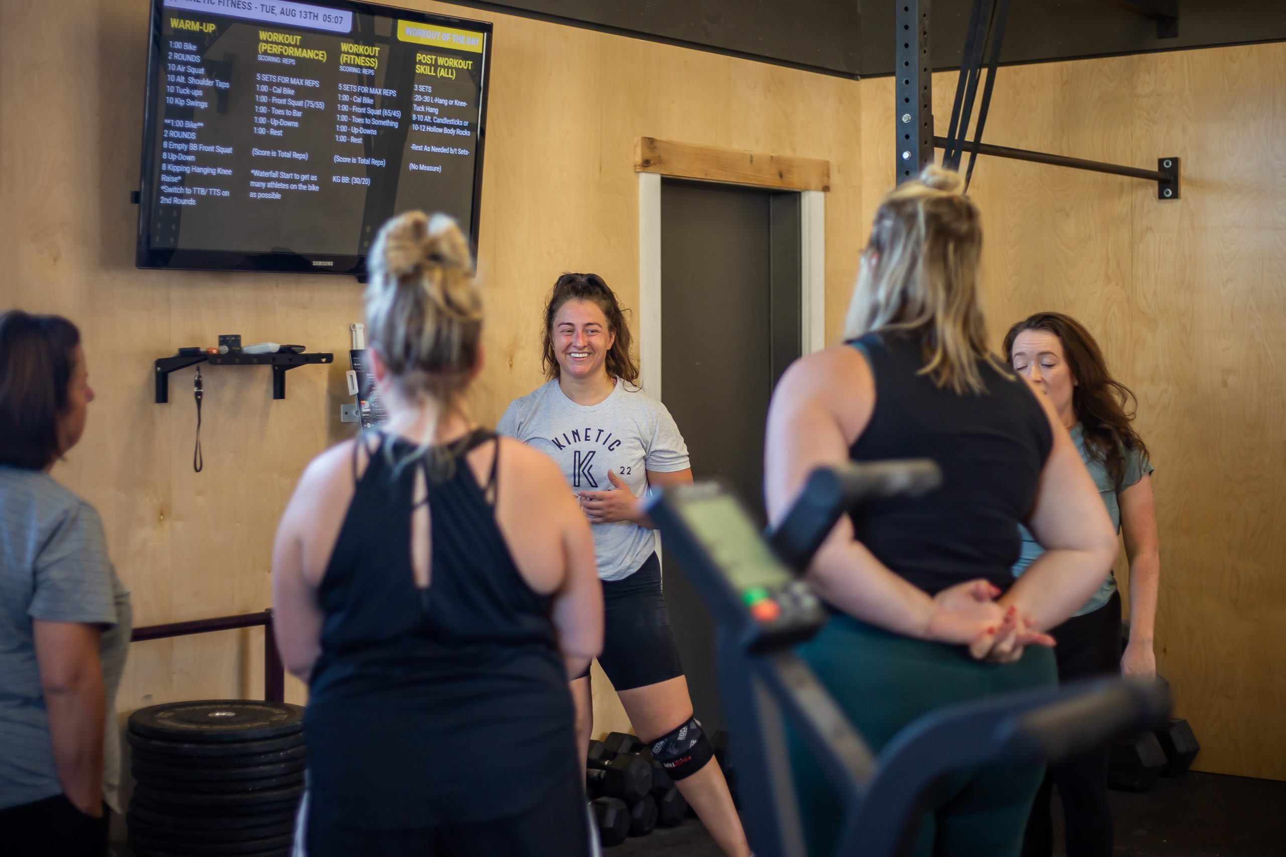 Kinetic-41 Coach presenting the Workout to semi-private training athletes